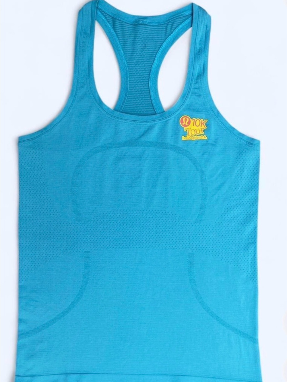 Lululemon Swiftly Tech Razorback Tank Top with logo. Size 12. NWOT. Never worn.